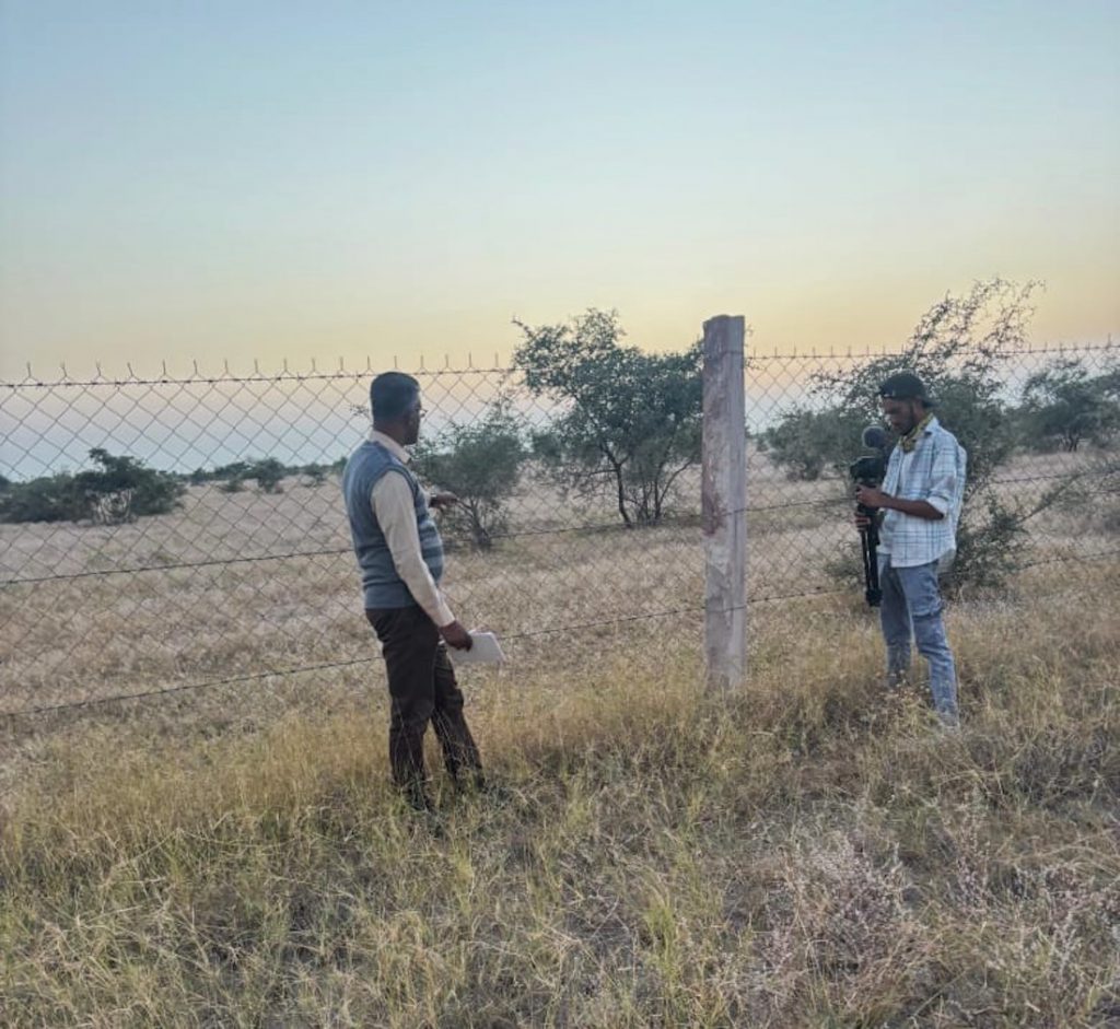 Green Hub fellow Prianshu recording my interview in the Great Indian Bustard habitat.